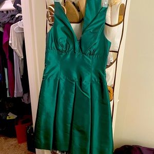 Green sleeveless formal knee length dress, size 6